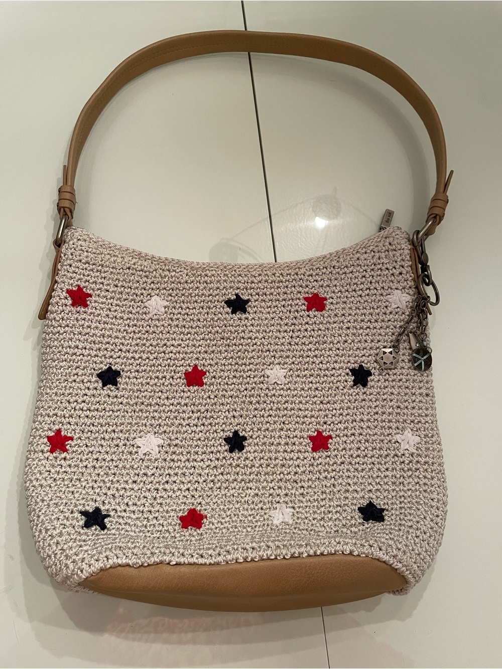 The Sak Crochet Star Shoulder Bag in Cream, Red, Navy and Tan